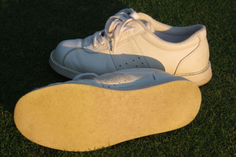 Heel-less shoes with small tread - running shoes will do.